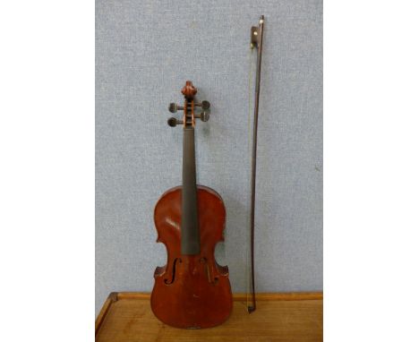 A violin and bow, cased 