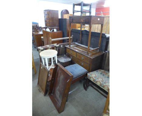 An oak chest of drawers, two folding card tables, clothes airer, oak console table, stools, etc. 