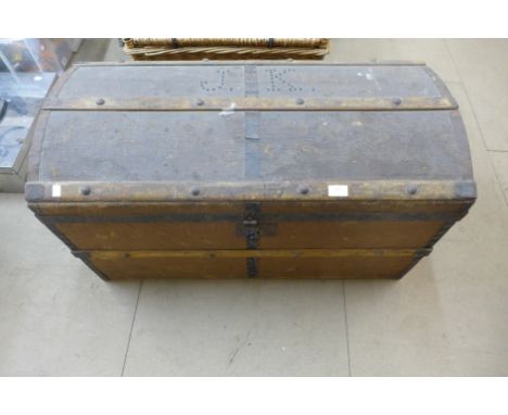 A Victorian dome topped steamer trunk 