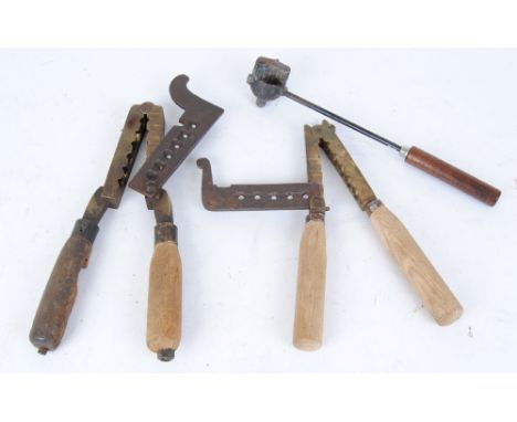 Two large brass bullet moulds, one stamped Willis & Willis 40 and lead ladle