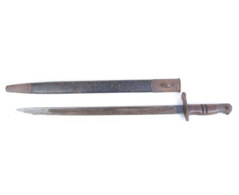 WW I bayonet with 17 ins fullered blade stamped Remington 1913 12 16 and Ordnance marks, wood grips, metal mounted leather sc