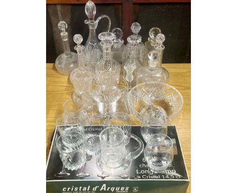 A quantity of decanters and other glassware.