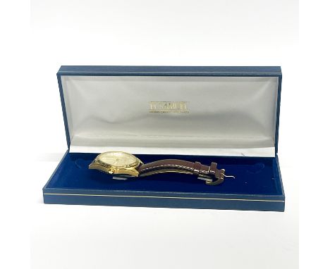 A gent's Seiko gold plated wrist watch.