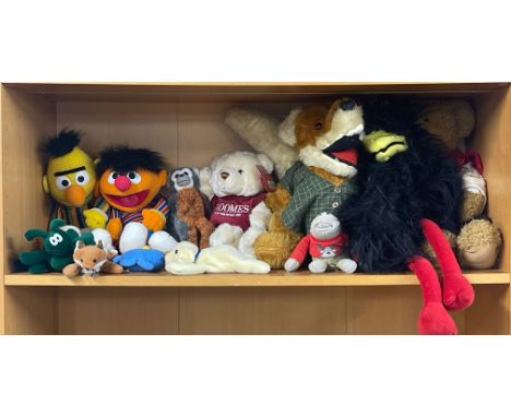 A group of mixed soft toys including Basil Brush.