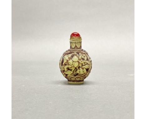 A Chinese Peking glass snuff bottle imitating jade.