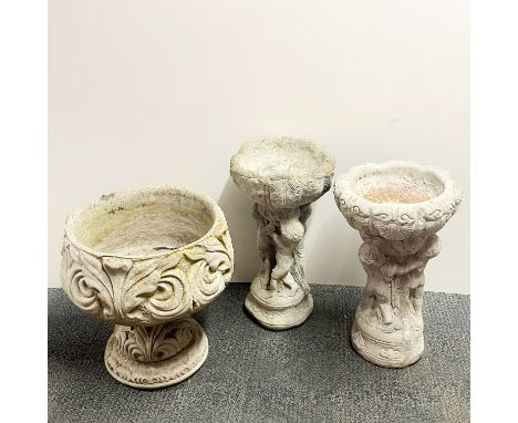A vintage cast concrete garden planter together with two similar concrete bird baths, planter H. 46cm Dia. 39cm.
