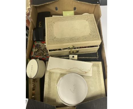 A large box of costume jewellery.