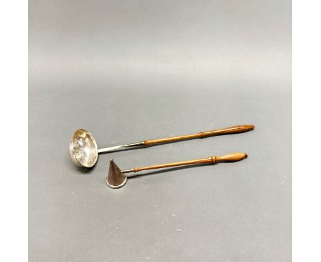A hallmarked silver candle snuffer, together with an antique white metal (tested silver) toddy ladle inset with a Georgian co