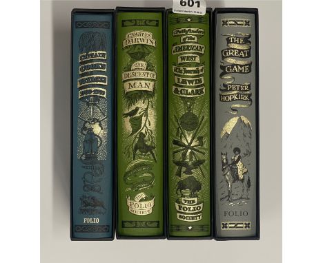 Folio Society: Four large volumes of classic literature, with illustrated spines.