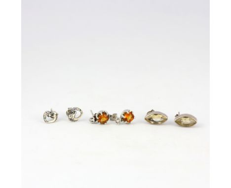 Three pairs of 925 silver stud earrings comprising of a pair of silver earrings set with round cut orange and white topaz, a 