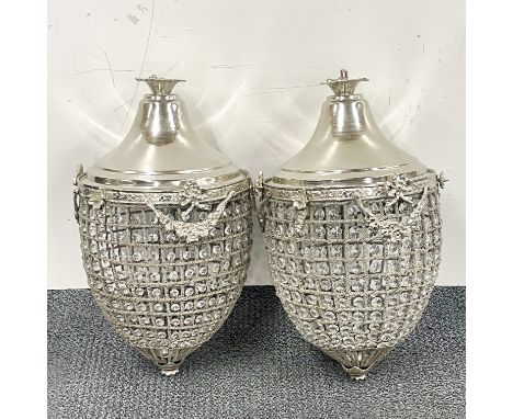 A pair of large silvered metal and crystal chandelier light fittings, H. 60cm, one with slight rust.