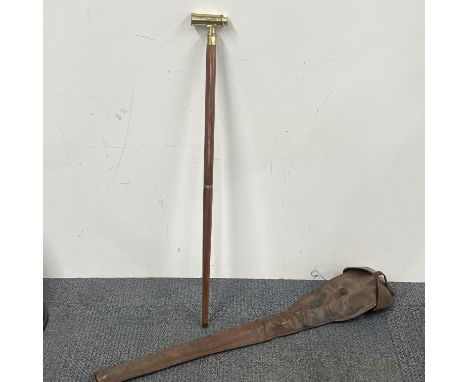 A brass and teak telescope walking stick with case.
