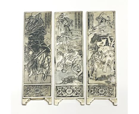 Three Chinese white metal screen scroll weights, H. 14.5cm.