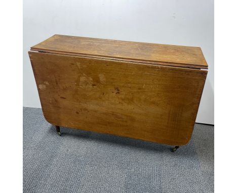 A large oak drop leaf gate leg table, extended 147 x 107 x 70cm. A/F to legs.