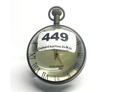 A globe style desk watch.