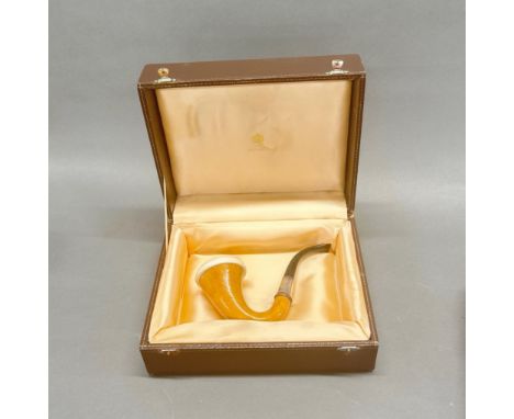 A Sherlock Holmes style tobacco pipe with silver band.