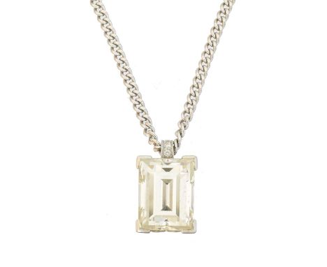 An impressive diamond pendant, An impressive diamond pendant, the approx. 5.85ct rectangular step cut diamond within a four c