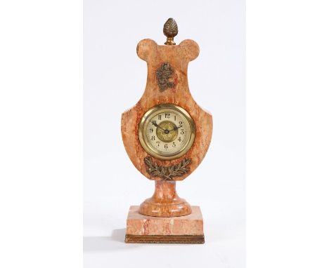Early 20th Century French marble mantle clock, of lyre form, with pineapple finial, the dial with Arabic numerals, 23.5cm hig