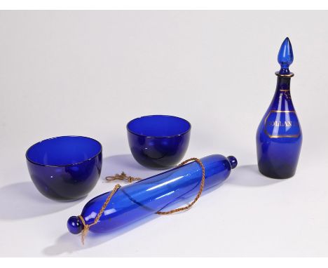 19th Century Bristol Blue Hollands glass decanter, with gold text and frame, together with a Bristol Blue rolling pin and a p