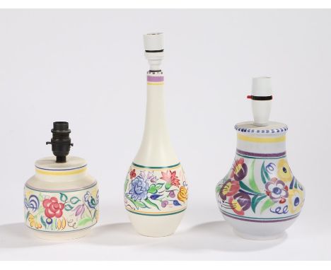 Three Poole pottery reading lamps, with polychrome foliate and scroll decoration (3)
