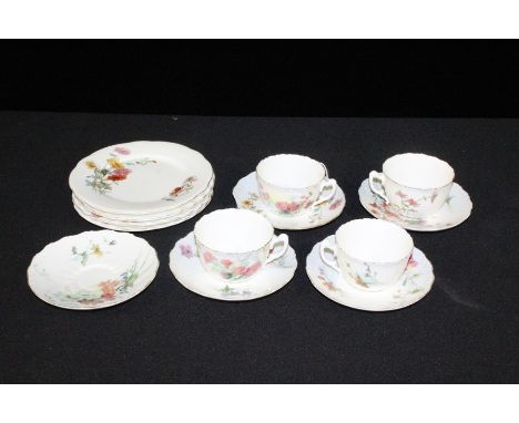 Royal Worcester harlequin part tea service, with floral spray decoration and gilt borders, consisting of four teacups, five s