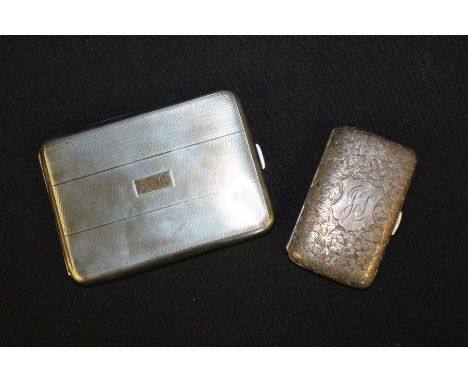 Victorian silver cigarette case, Birmingham 1894, maker Henry Williamson Ltd, the exterior with scroll decoration and monogra