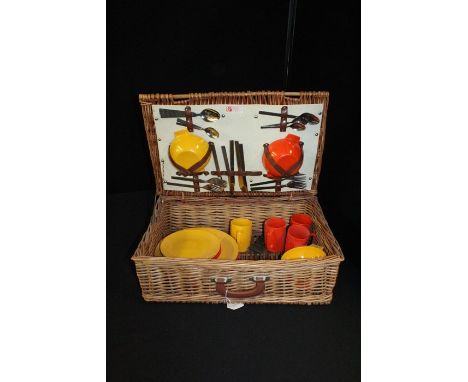 Optima Melaware picnic set, plates, side plates, mugs, bowls and cutlery held in a wicker hamper