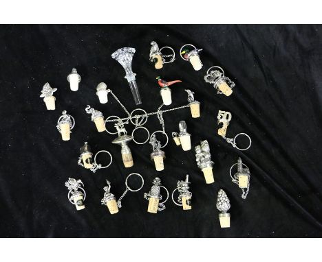 Collection of bottle stoppers/corks, in various designs in silver colour, (qty)