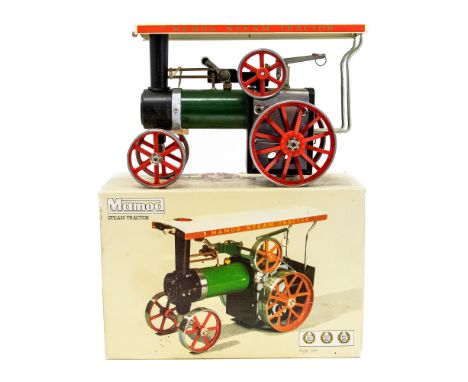 Mamod: A boxed Mamod Steam Tractor, TE1a, complete with scuttle, steering rod and oil, box as found.