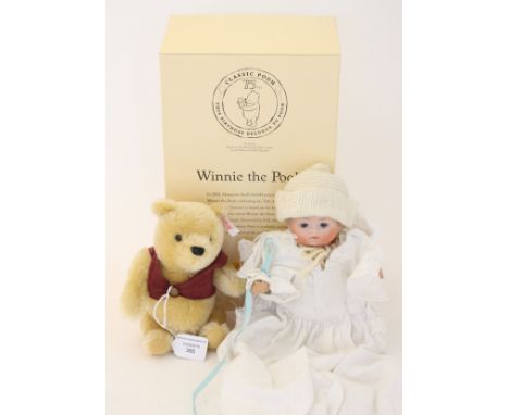 Doll: An Armand Marseille style 'dream baby' doll, together with a boxed Steiff 'Winnie The Pooh'. (2)