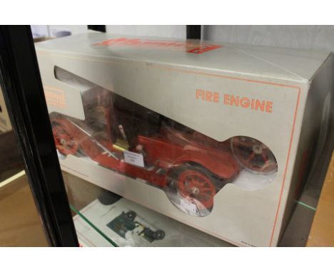 Mamod: A boxed Mamod Fire Engine, FE1, red livery, complete with Solid Fuel Tablets and oil, box lid as found.