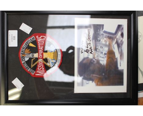 Framed and glazed Apollo 13 mission control photograph, signed Sy Liebergot, 4-3-70 with mission patch 