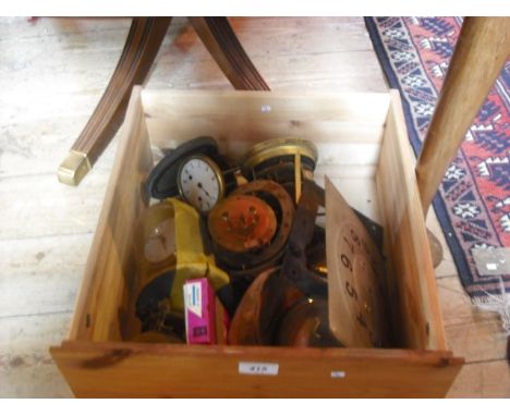 A mixed lot of mantle clock and other movements, a brass dial and other associated items.