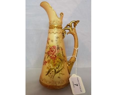 A Royal Worcester blush ivory ewer of tapering conical form, typically decorated with spring flowers on a blush ivory ground.