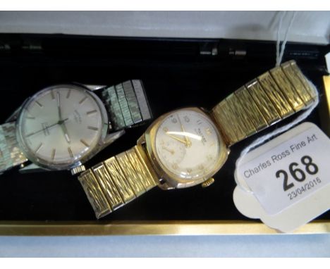 A gentleman's 9 carat gold Rotary wristwatch, circular champagne dial with Arabic numerals and subsidiary seconds at six o'cl