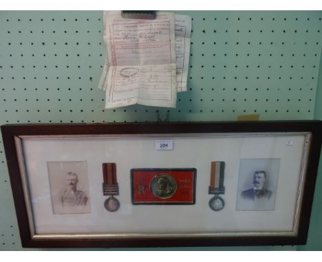 A framed pair of South African medals to 4070 Private Thomas Beacroft, Scottish Rifles, presented with two photographic portr