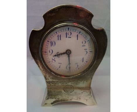 William Comyns, a silver cased balloon shaped mantel timepiece, with enamel Arabic dial, London 1907.