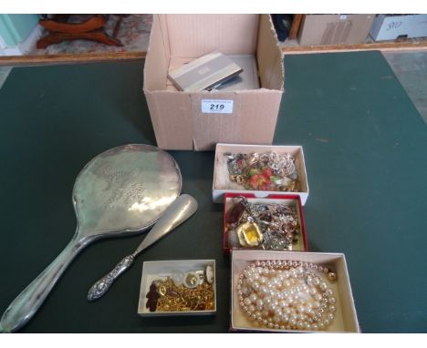 A small mixed lot of costume and paste set jewellery, a silver backed hand mirror, a shoe horn and two white metal cigarette 