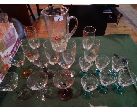 A circa 1950's/60's lemonade set, comprising jug and six glasses, each transfer decorated with a hunting scene, together with