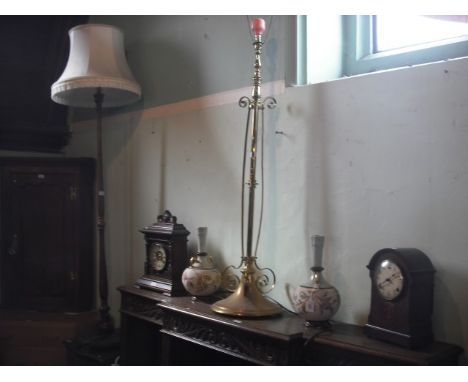 A brass telescopic standard lamp.