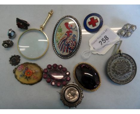 An Eton College Regular Attendance medal, together with various brooches, including a French Red Cross brooch, mourning brooc