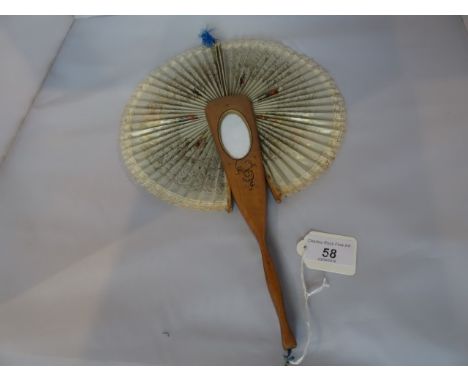 An early/mid-20th century Italian olive wood handled cockade fan, the single stick set with mirror and painted with a swallow