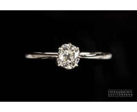 An antique cushion cut diamond single stone ring, claw set in 18ct white gold, size P½, with box