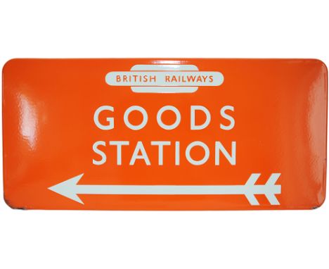 BR(NE) enamel Direction Sign GOODS STATION  with left facing arrow and British Railways in Totem, fully flanged, light tanger