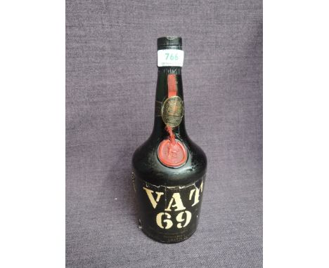 A bottle of Vat 69 Blended Scotch Whisky, 70 proof no capacity stated, by appointment to The Queen, possible 1960's