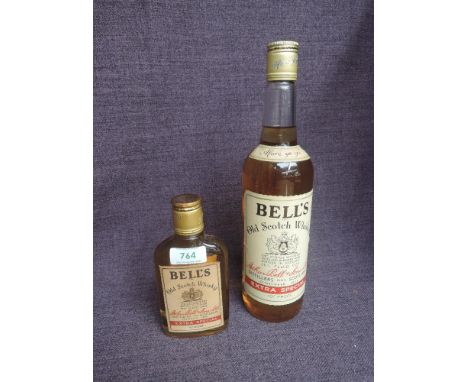Two bottles of 1970's Bells Extra Special Blended Scotch Whisky, no 0711871Z7 70 proof 26 2/3 fl oz and no 74156Qxt, 70 proof