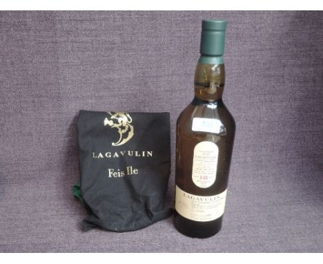 A bottle of Lagavulin 16 Year Old Islay Single Malt Scotch Whisky, Feis Ile 2017, Double Matured in Moscatel cask wood, bottl