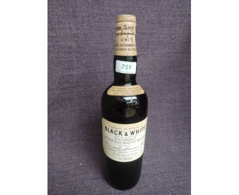 A bottle of 1960's Black &amp; White Special Blend of Buchanan's Choice Old Scotch Whisky, by appointment to Her Majesty The 