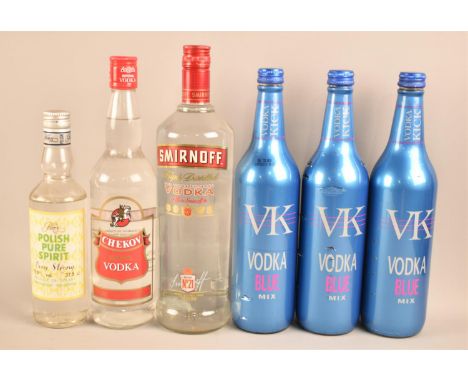 Three Bottles of Vodka Blue Mix, One Bottle Chekov Vodka, Smirnoff Vodka and Polish Pure Spirit 