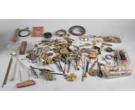 A Collection of Clock Parts and Tools to include Hands, Bells, Pulleys Etc 